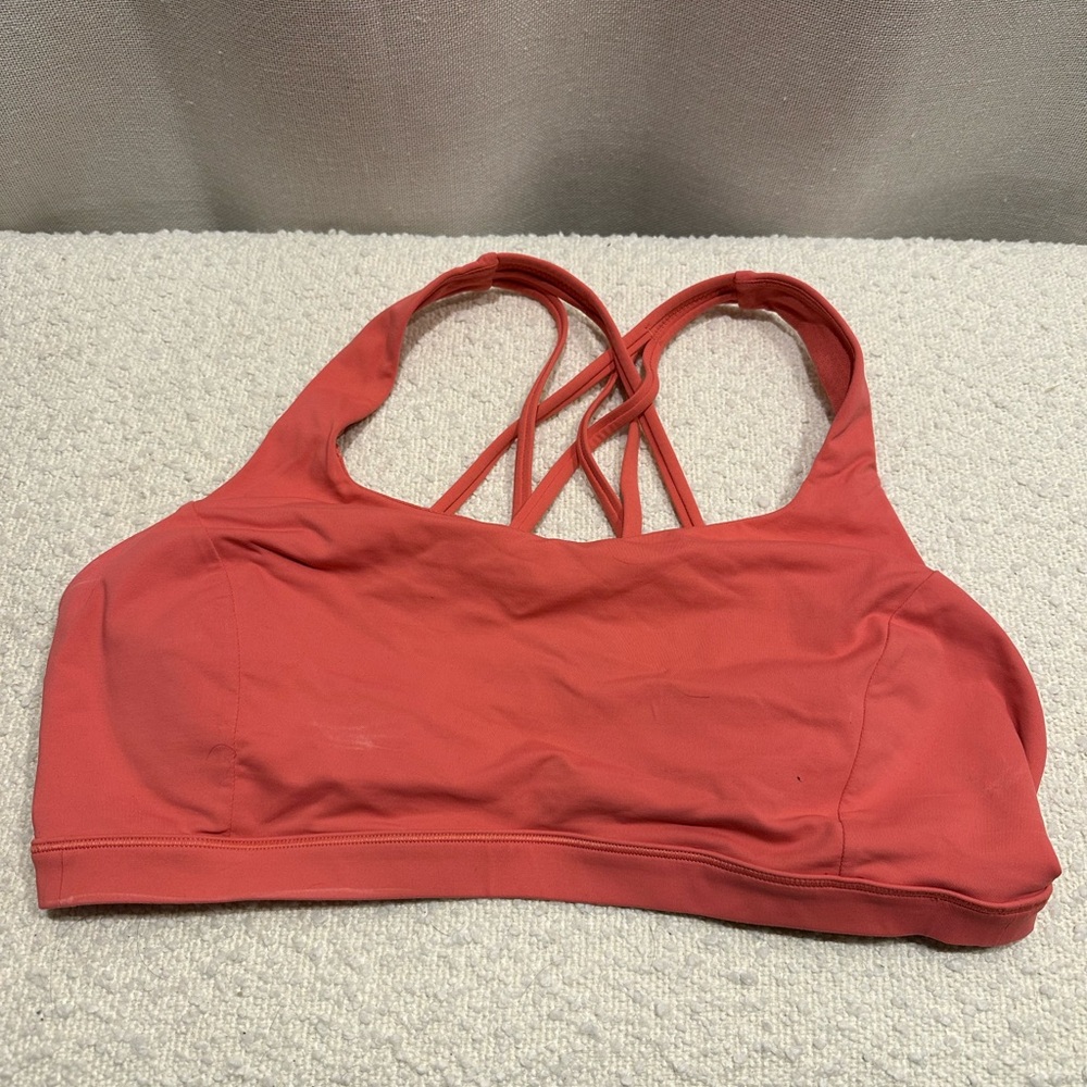 lululemon athletica Crossback Strappy Sports Bra in Coral Pink